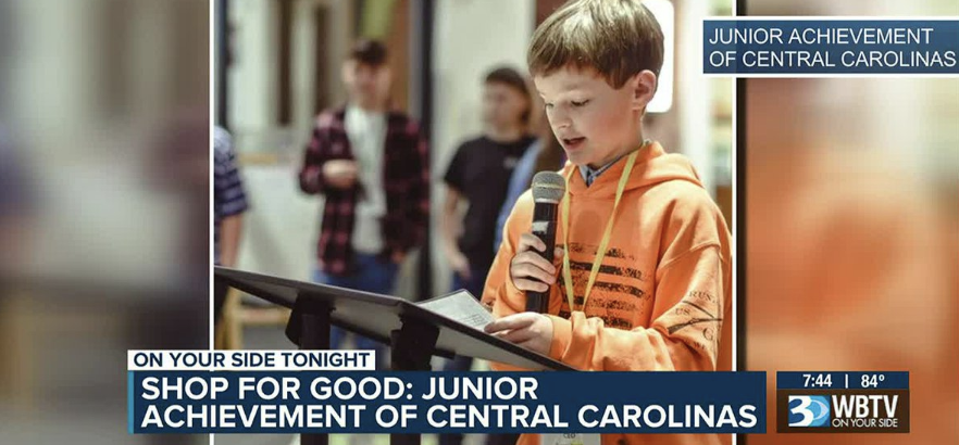 junior achievement student with mic at podium