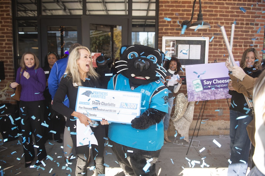 melissa gets surprised with a check from sir purr