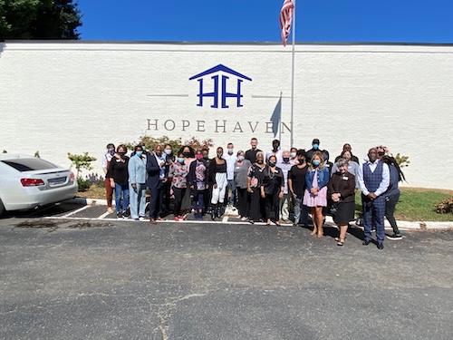 hope haven staff in front of building