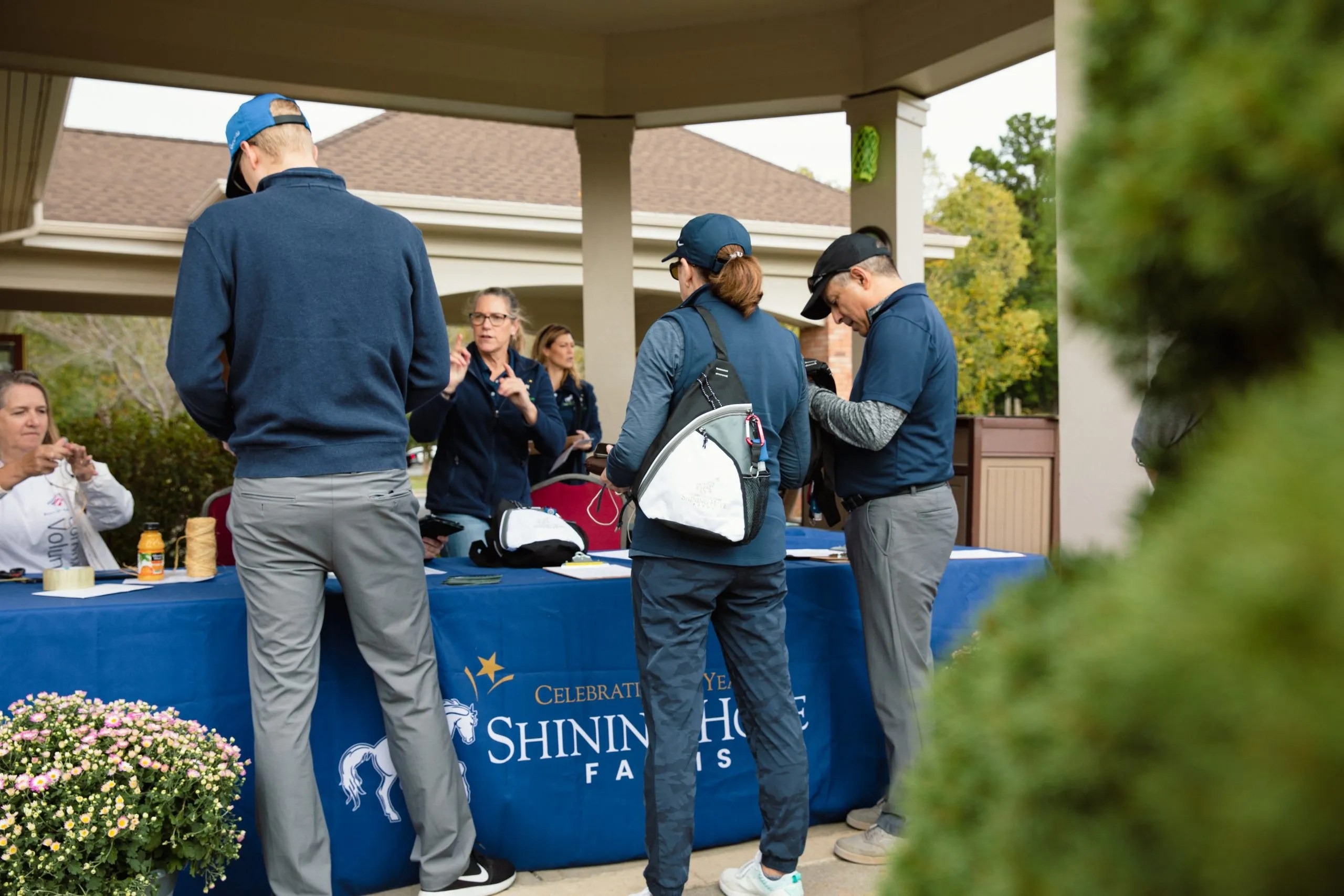 Shining Hope Farms Golf Tournament Registration Table