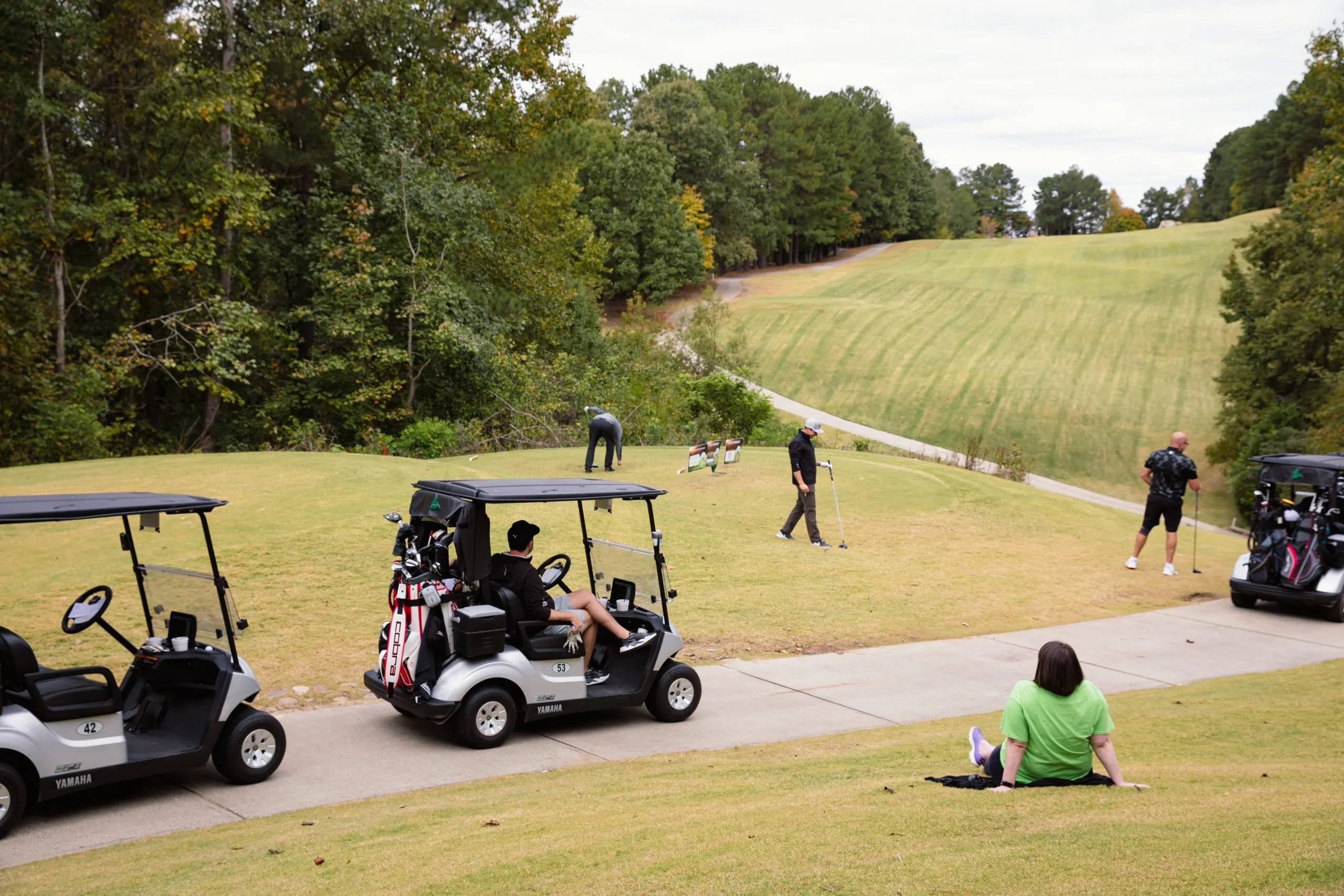 Players playing in Shining Hope Farms' Charity Golf Tournament