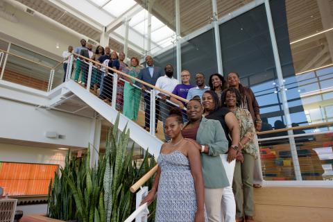 black nonprofit leaders pose on stairwell