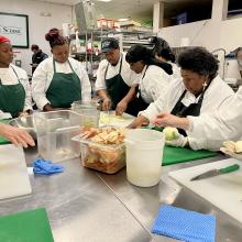 culinary students work in the kitchen