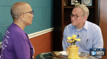 jamie boll interviews founder of frankie mae foundation at memory cafe table