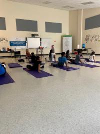 barre belle in action yoga in a school